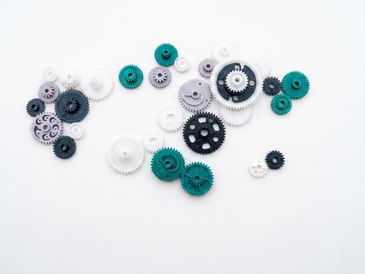 Precision-molded plastic gears in assorted colours