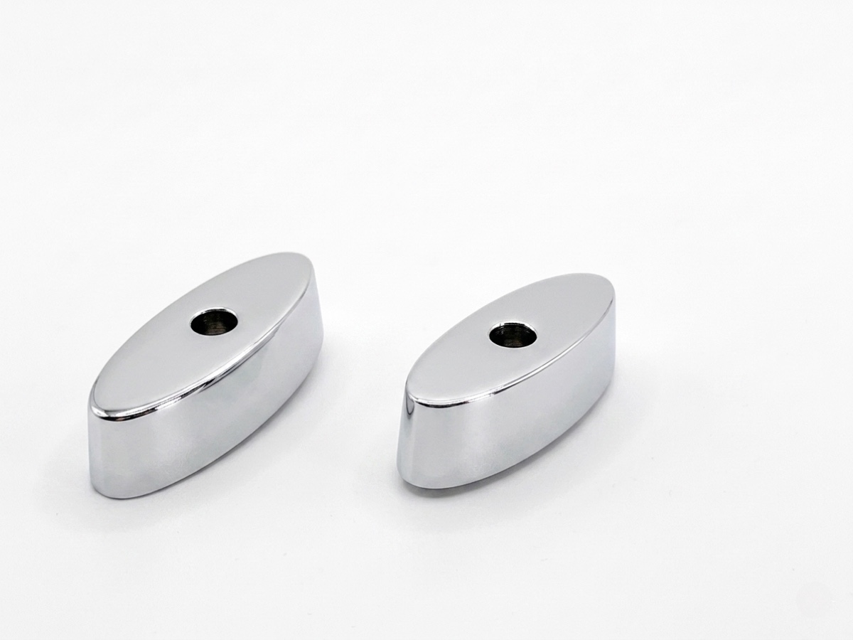 Die-cast oval cover plates with through-holes