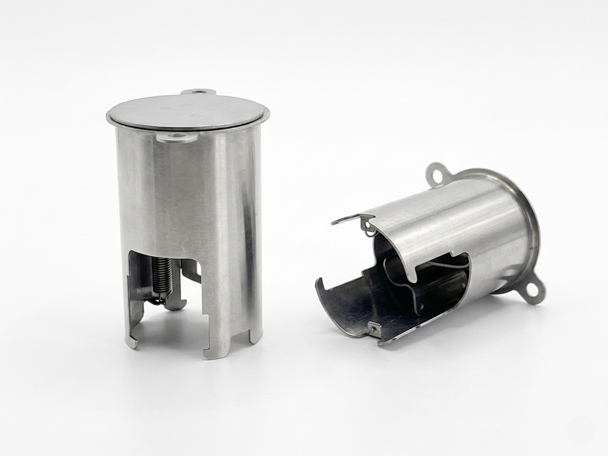 Deep-drawn stainless steel cylindrical housings